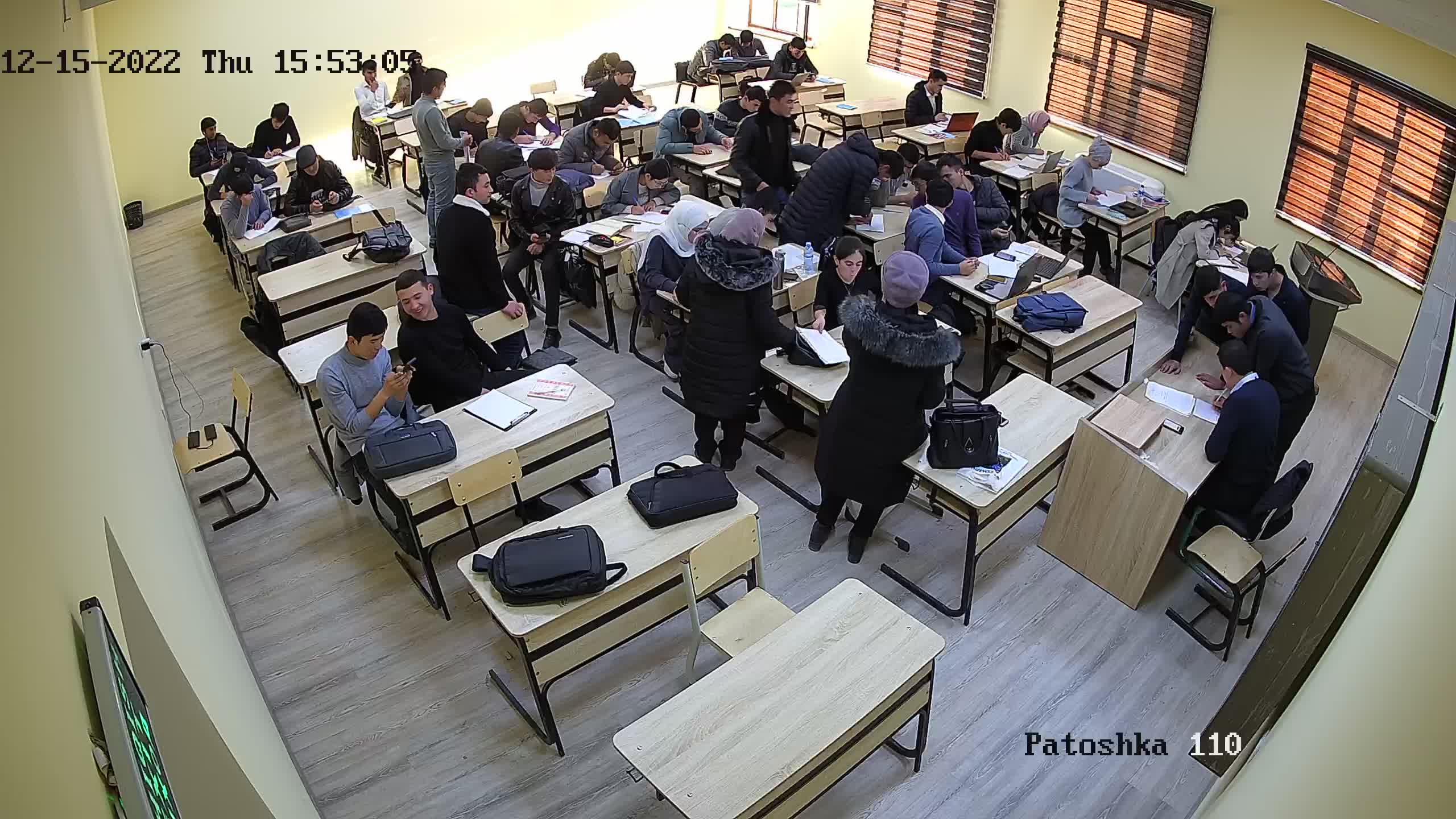 Online camera in a large lecture room during written work